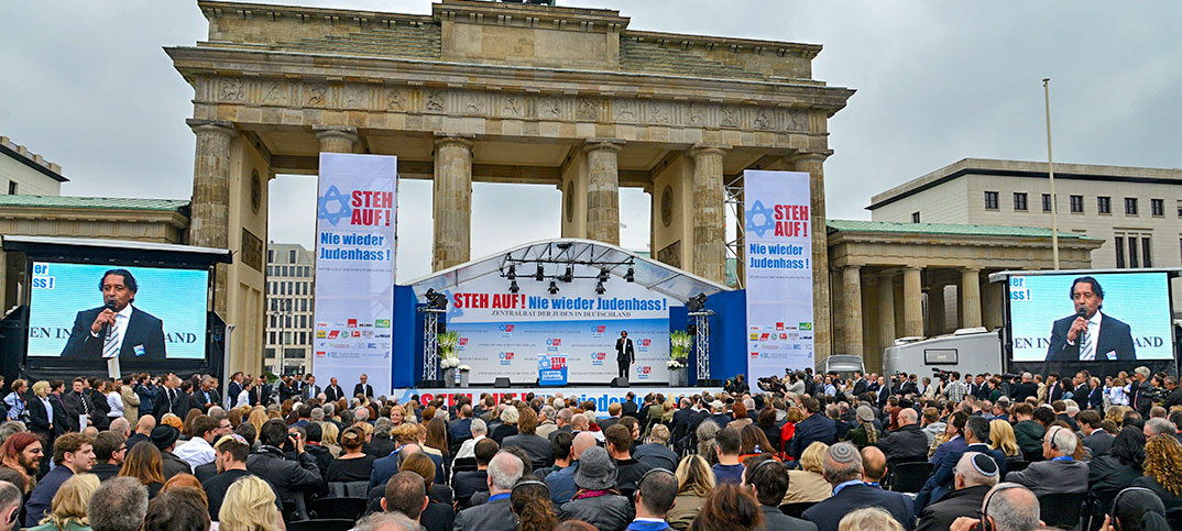 Cherno Jobatey hosts anti-semitism rallye at Brandenburg Gate Berlin